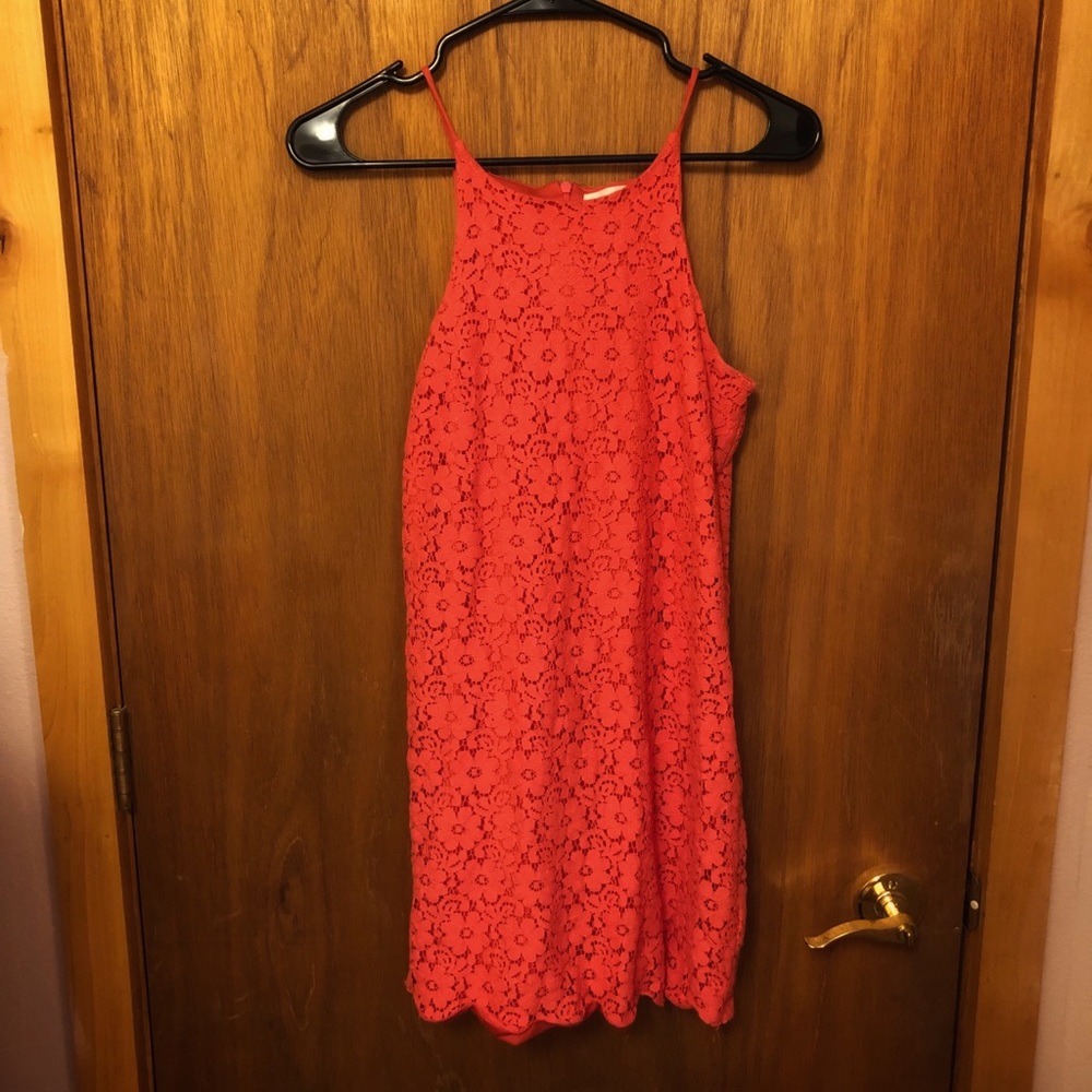 Pink lacey summer dress w/ flower pattern.